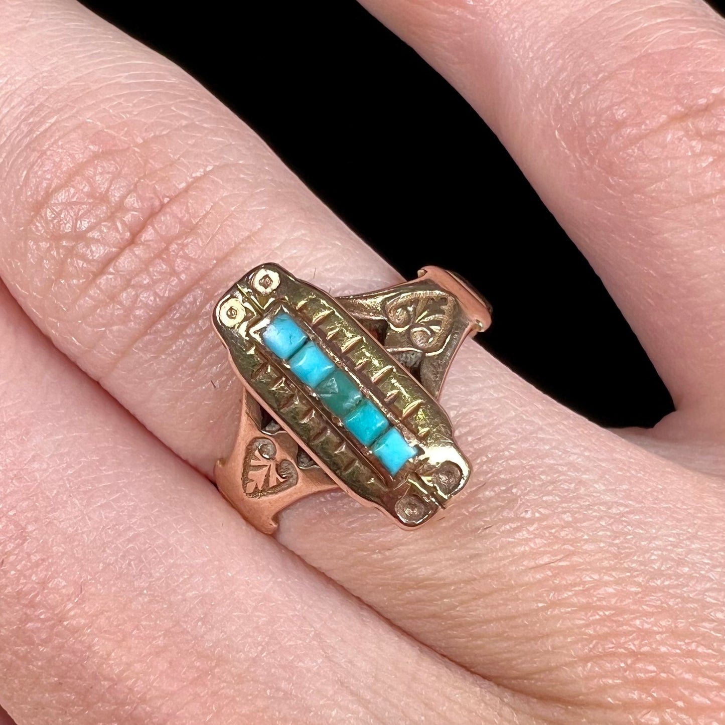 Antique yellow gold ring set with five square turquoise stones, circa 1920's.