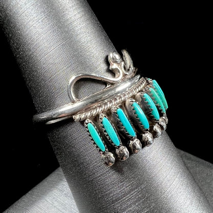 A ladies' Zuni Indian ring set with natural Sleeping Beauty needlepoint turquoise stones.