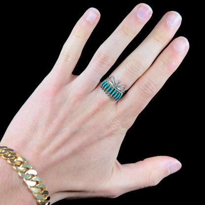 A ladies' Zuni Indian ring set with natural Sleeping Beauty needlepoint turquoise stones.