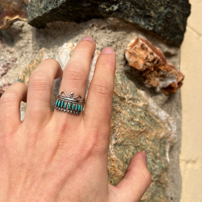 A ladies' Zuni Indian ring set with natural Sleeping Beauty needlepoint turquoise stones.