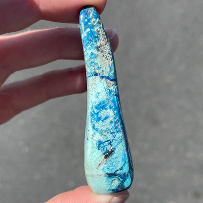 An large, polished, drop shape Morenci turquoise and azurite specimen.  Material is not stabilized.