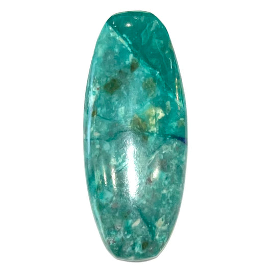 A loose, oval cabochon cut chrysocolla stone with blue azurite inclusions.