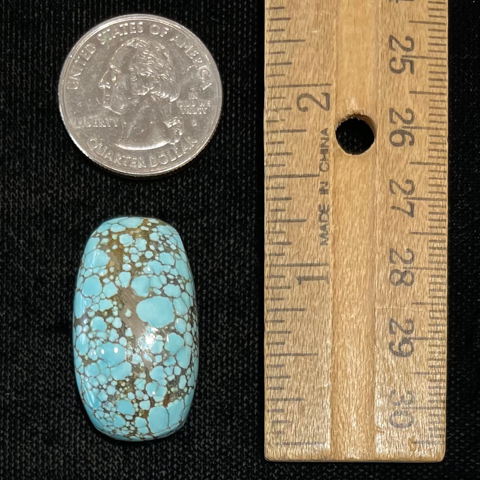 A loose spiderweb turquoise stone from Number 8 Mine in Lander County, Nevada.