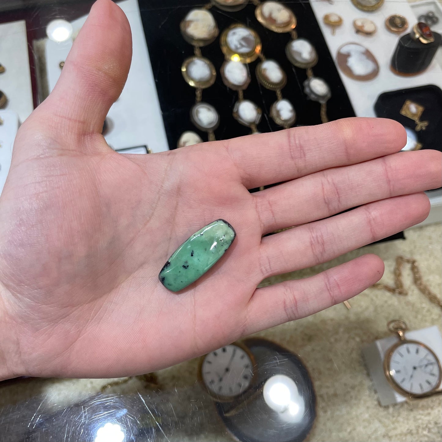 A loose, green turquoise stone cabochon from Royston Mining District, Arizona.