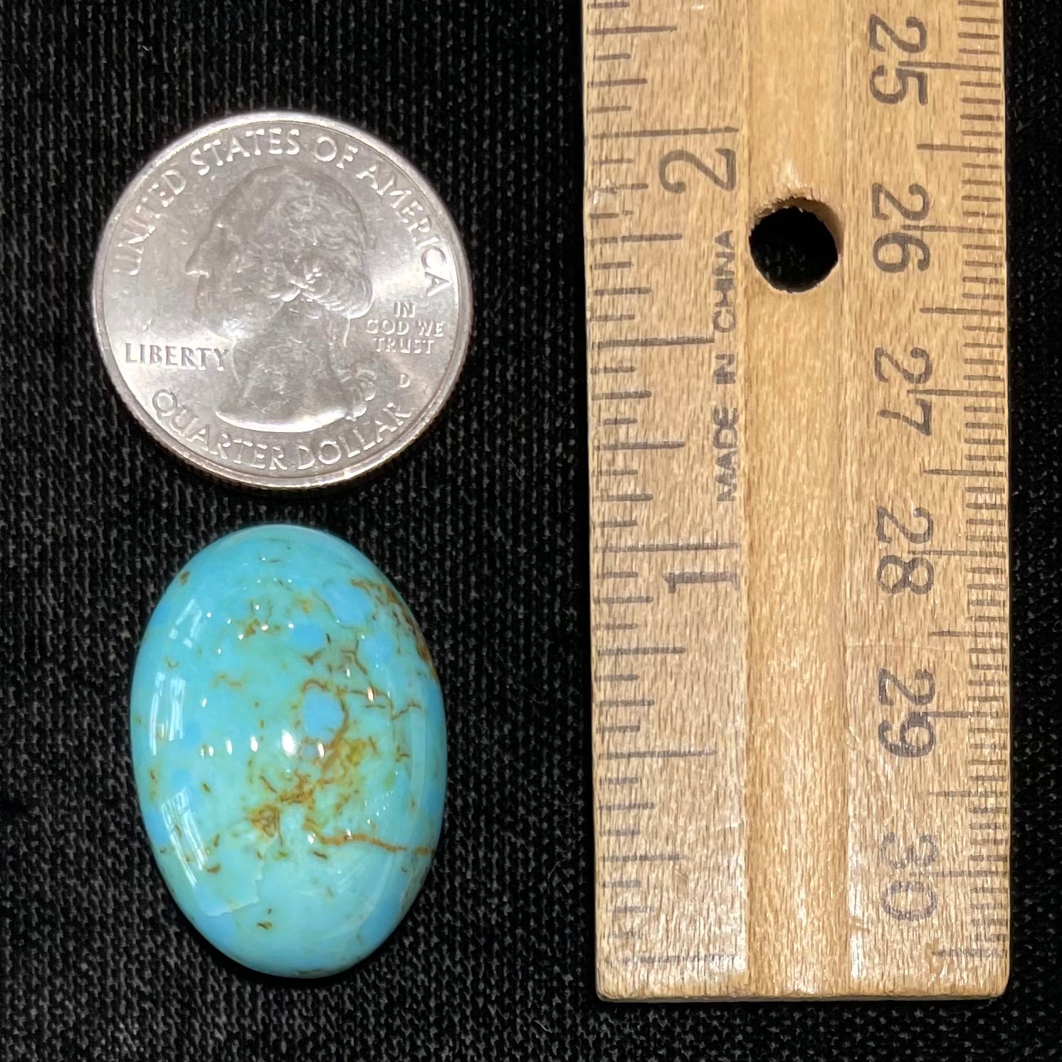 A loose Pilot Mountain turquoise stone cabochon.