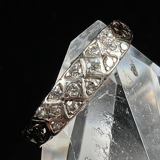 An antique yellow gold ladies' band set with old European cut diamonds.