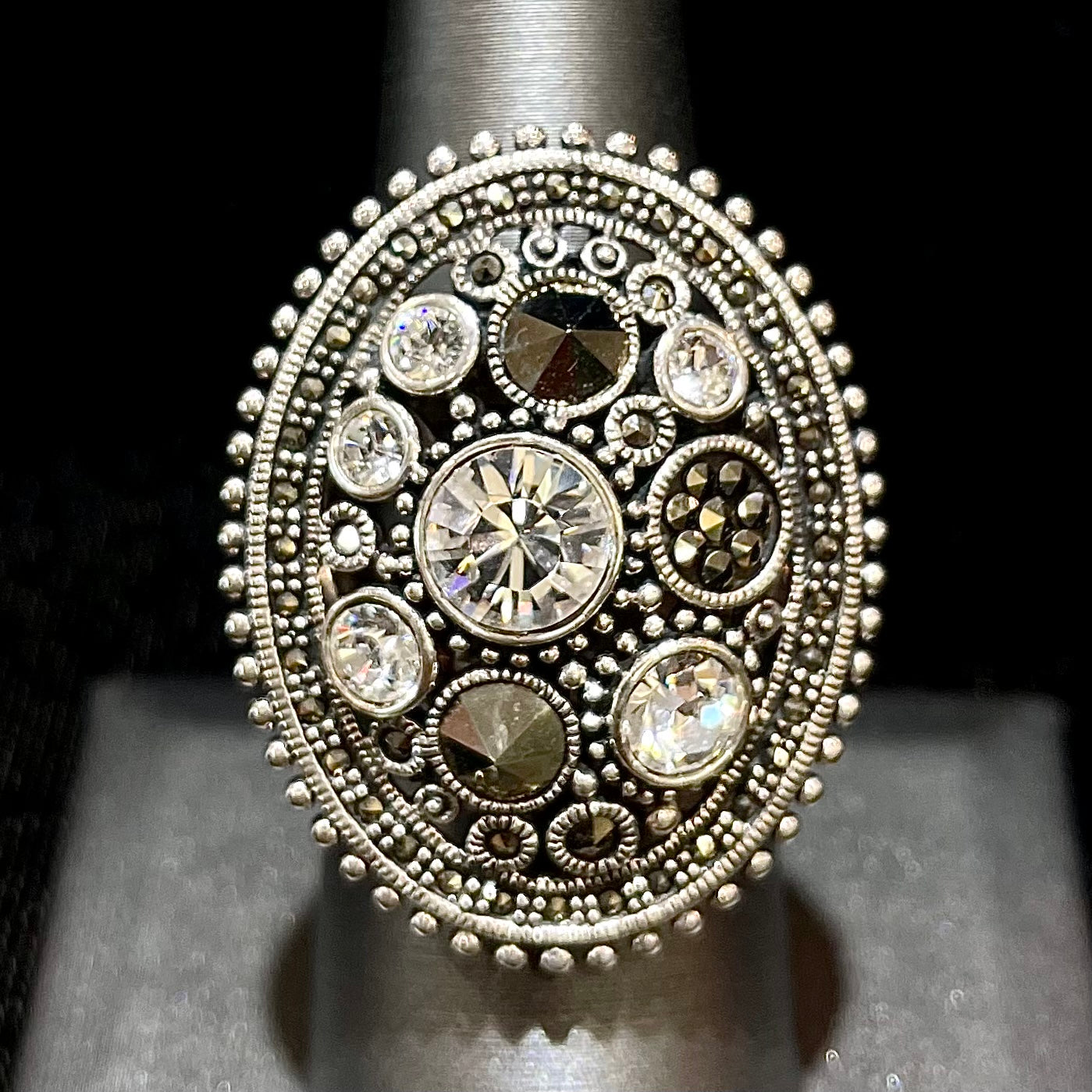 Silver Steam Punk style gear ring set with marcasite and glass stones.