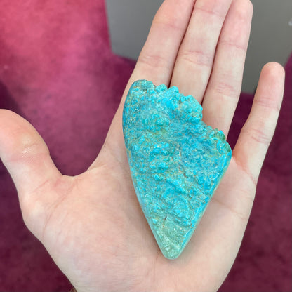 A loose, lightly polished turquoise nugget from Sleeping Beauty Mine, Arizona.