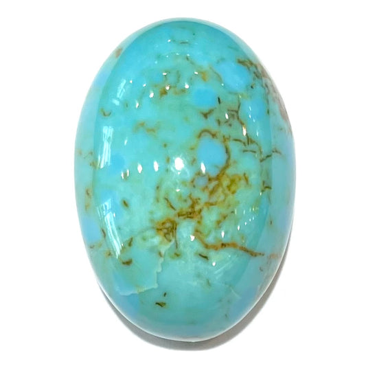 A loose Pilot Mountain turquoise stone cabochon.