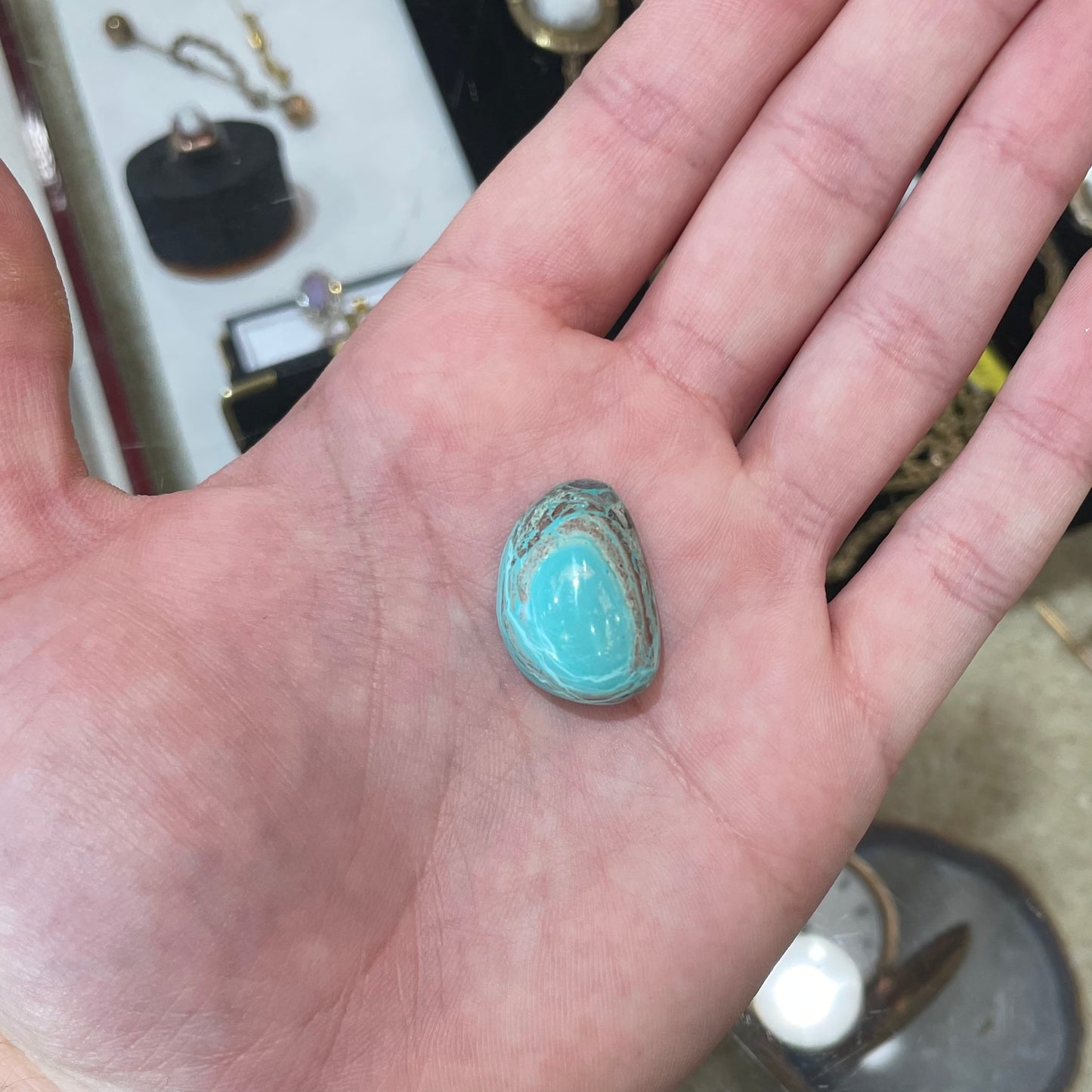 A polished, light blue Eilat Stone from Israel.