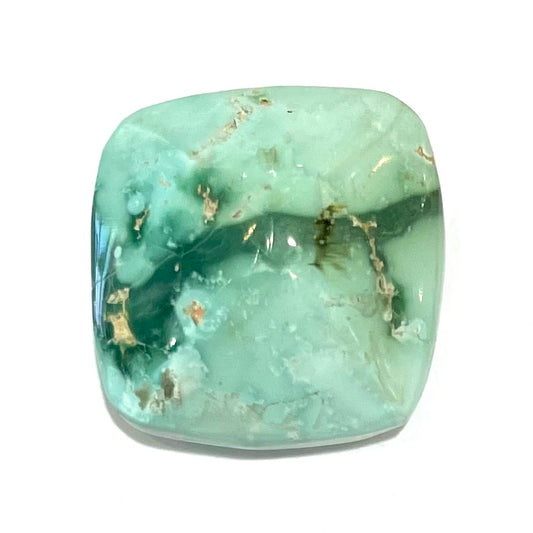 A loose, cushion cabochon cut variscite stone from Utah, USA.