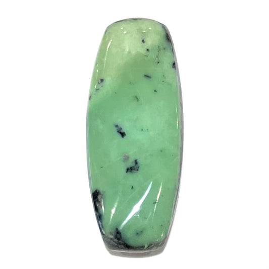 A loose, green turquoise stone cabochon from Royston Mining District, Arizona.