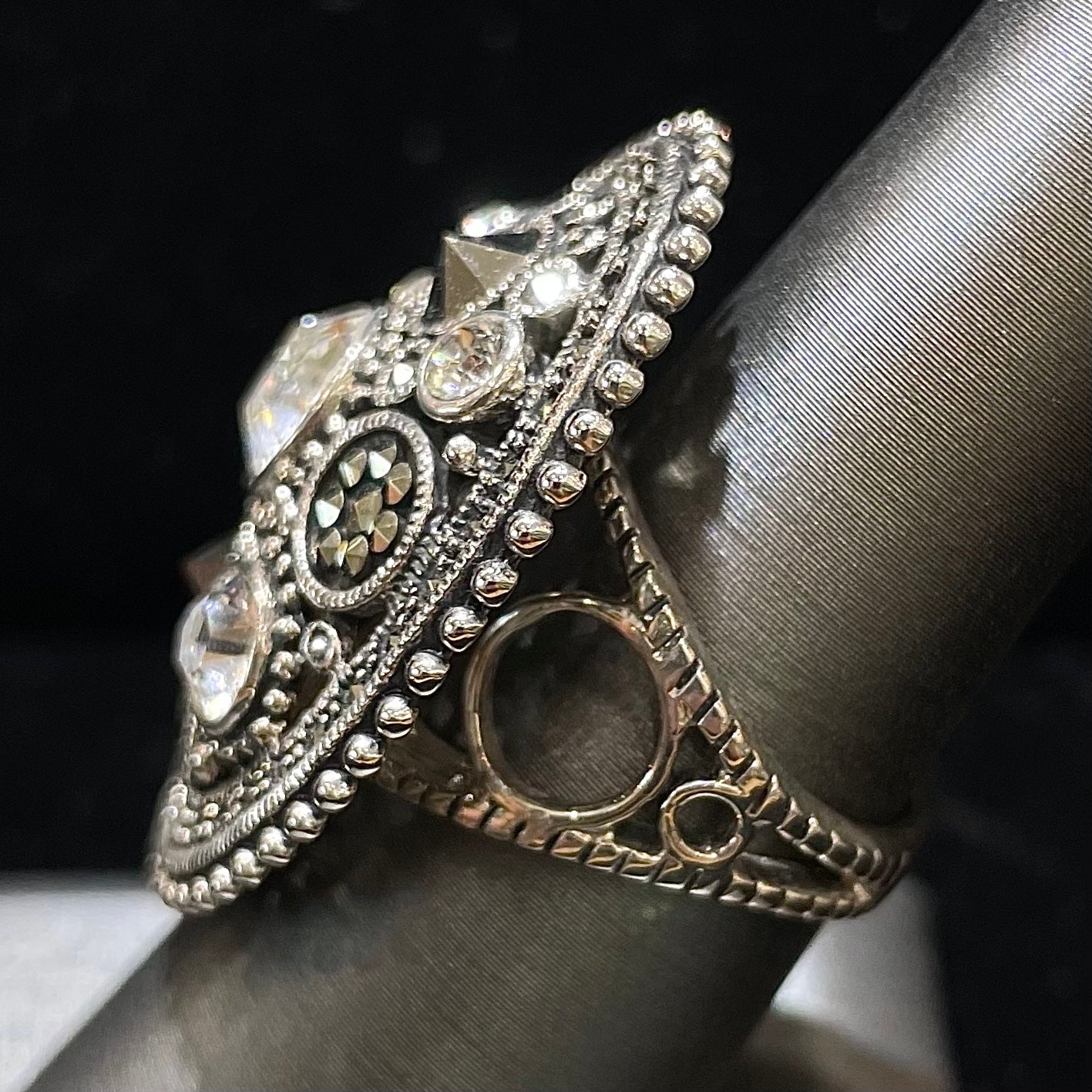 Silver Steam Punk style gear ring set with marcasite and round faceted glass stones.