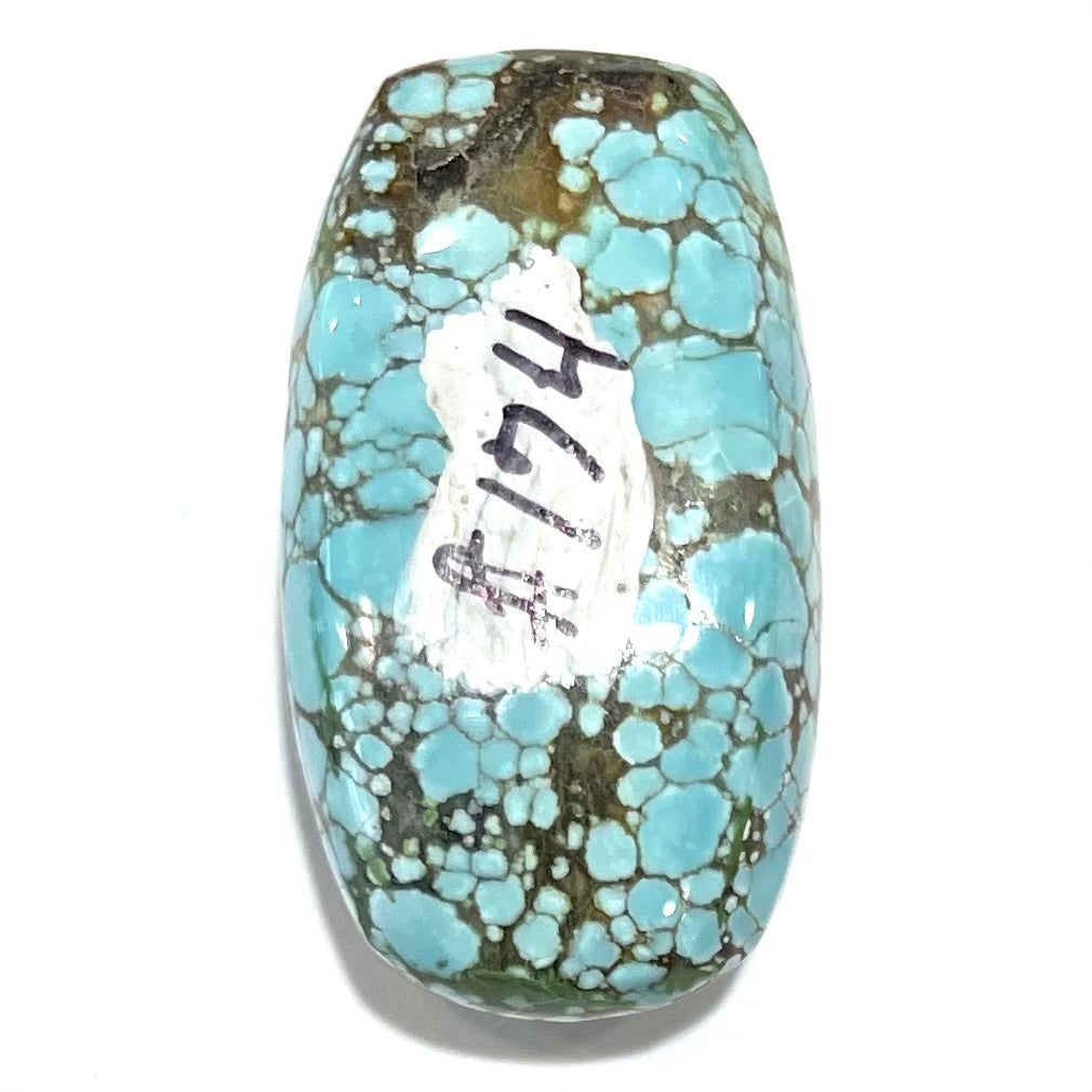 A loose spiderweb turquoise stone from Number 8 Mine in Lander County, Nevada.