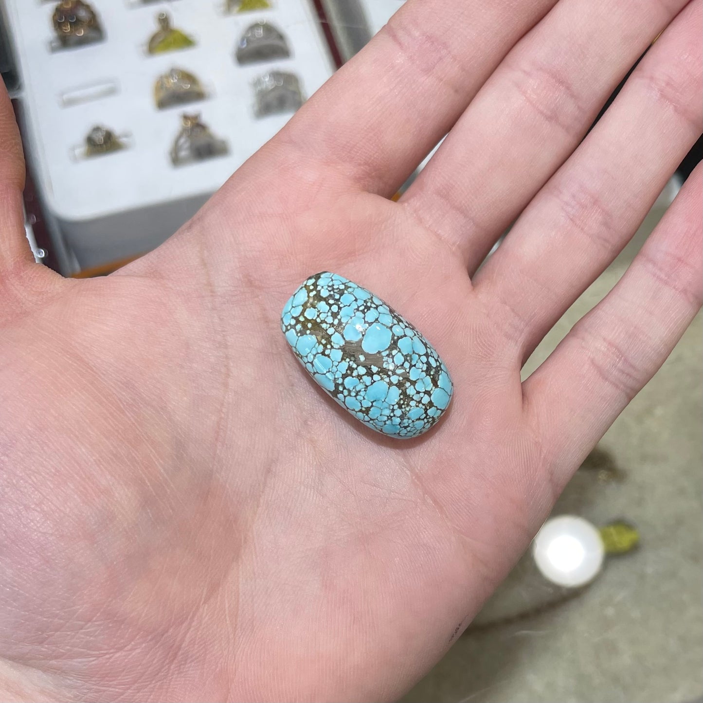 A loose spiderweb turquoise stone from Number 8 Mine in Lander County, Nevada.