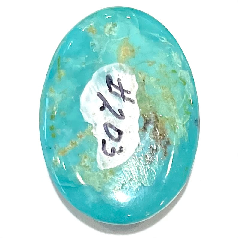 A loose, oval cabochon cut blue turquoise stone from Royston Mining District, Nevada.