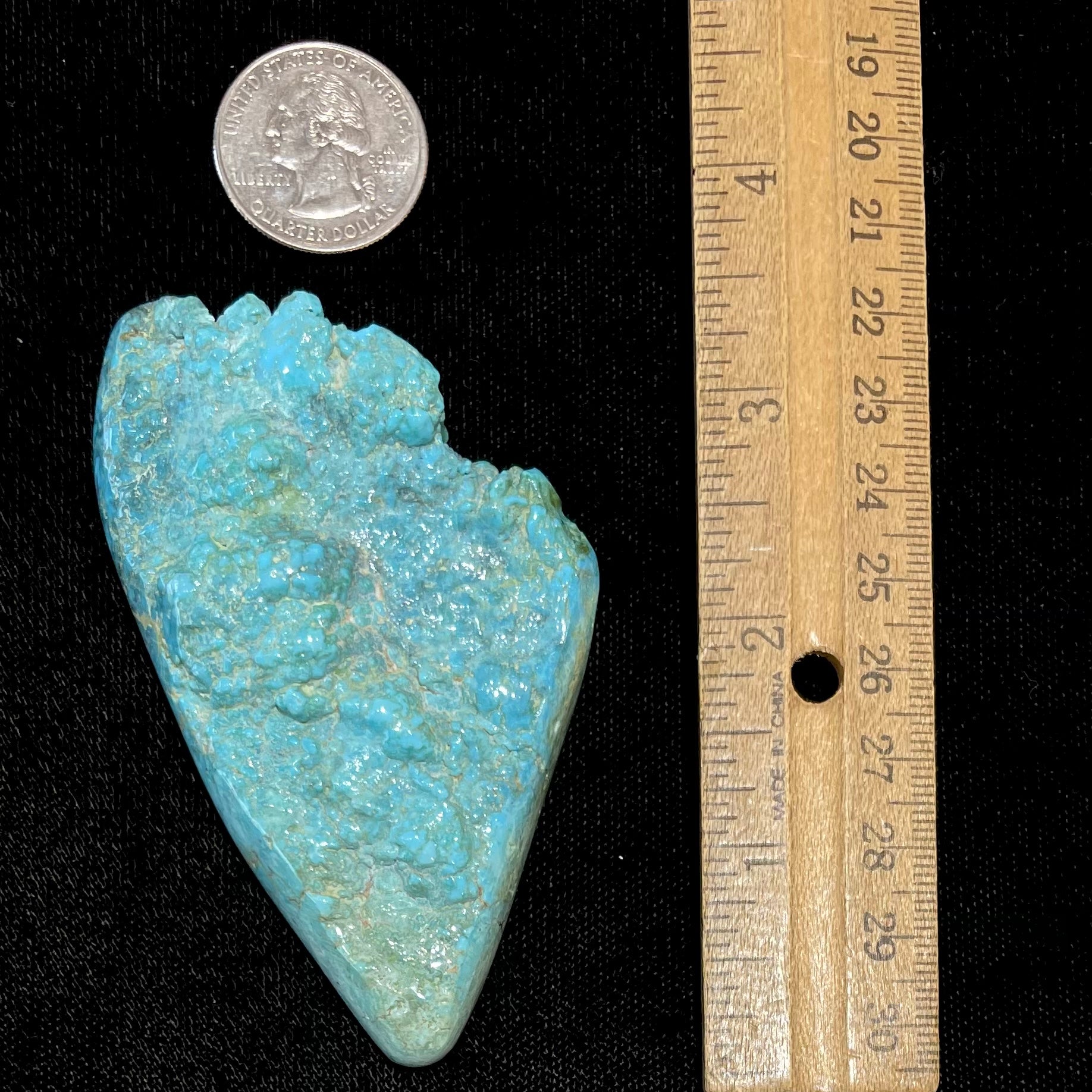 A loose, lightly polished turquoise nugget from Sleeping Beauty Mine, Arizona.