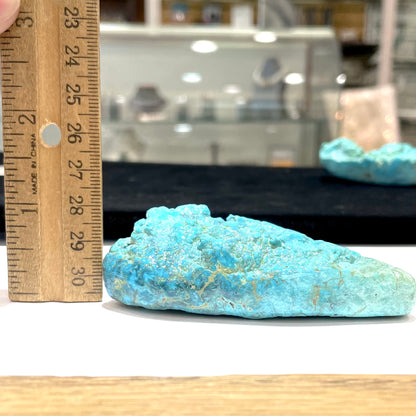 A loose, lightly polished turquoise nugget from Sleeping Beauty Mine, Arizona.