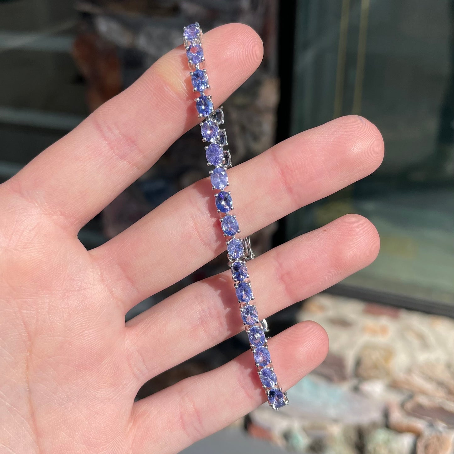 Sterling silver tanzanite tennis bracelet for sale.