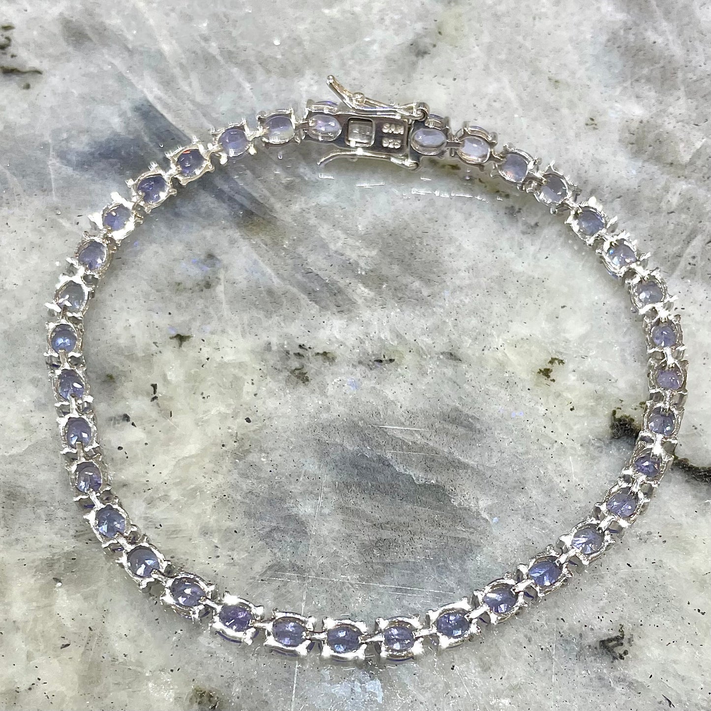 Sterling silver tennis bracelet.