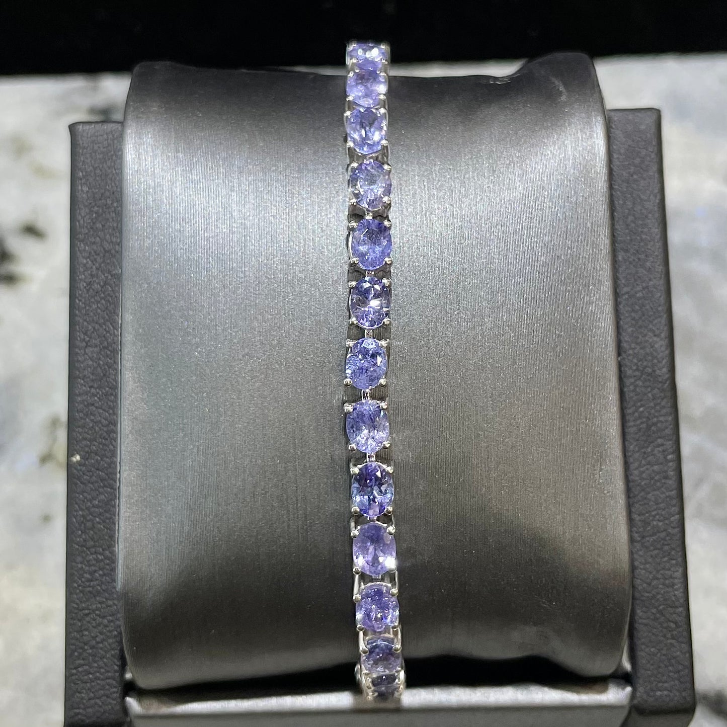 Sterling silver blue tanzanite tennis bracelet.