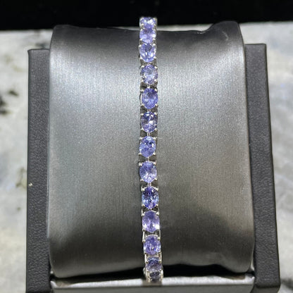 Sterling silver blue tanzanite tennis bracelet.