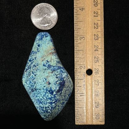 A freeform shape, polished azurite in turquoise stone.