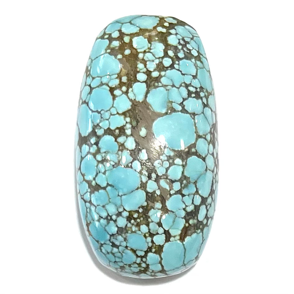 A loose spiderweb turquoise stone from Number 8 Mine in Lander County, Nevada.