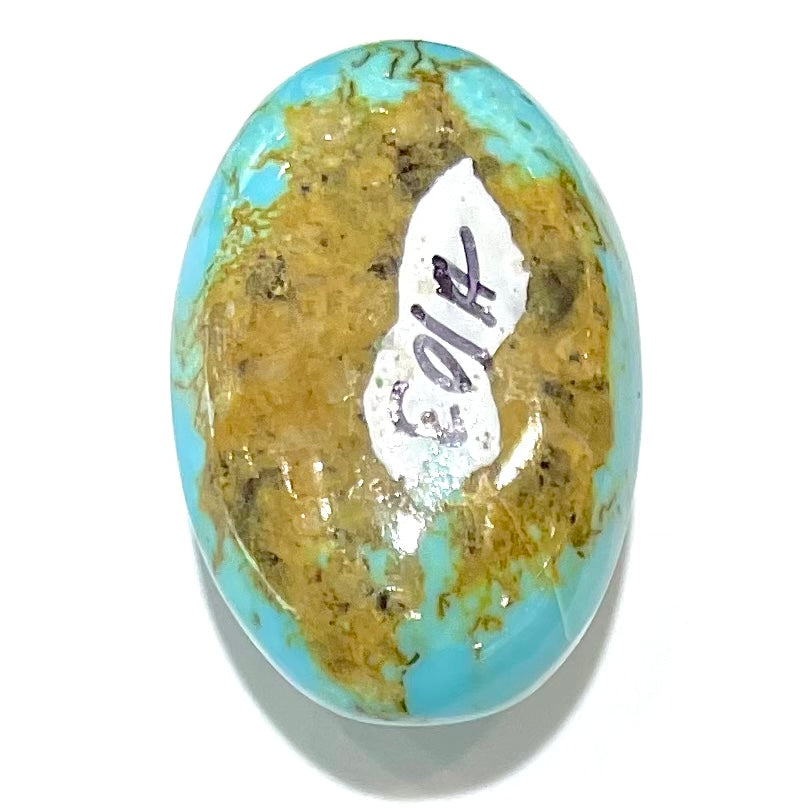 A loose Pilot Mountain turquoise stone cabochon.