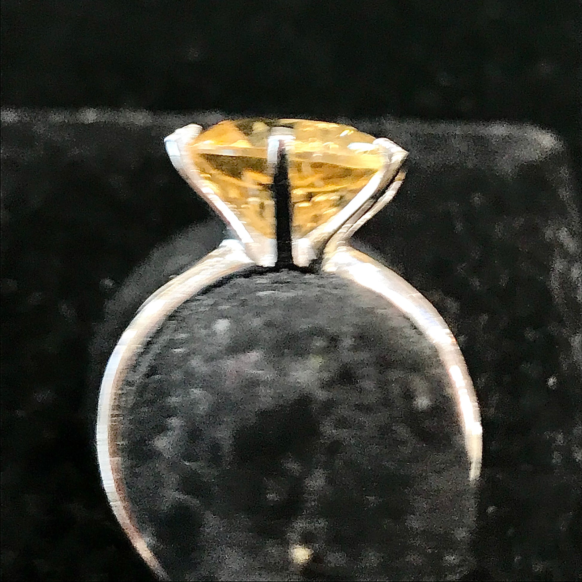 Light yellow citrine ring set in sterling silver.