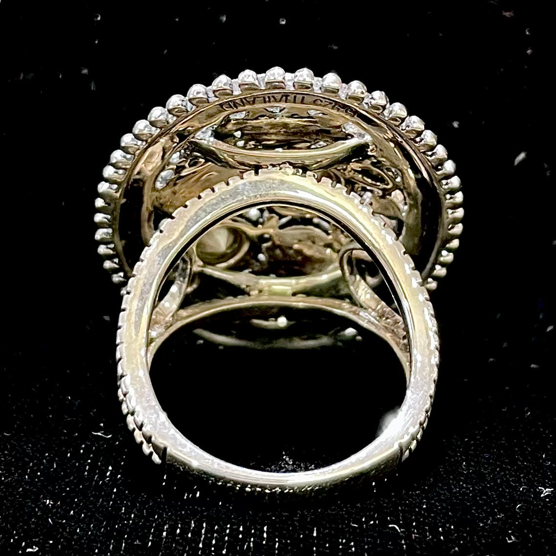 Silver Steam Punk style gear ring set with marcasite and round faceted glass stones.