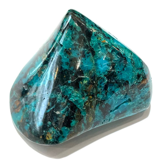 A polished freeform shaped chrysocolla specimen.