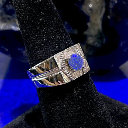 A round black crystal opal solitaire sterling silver men's ring.