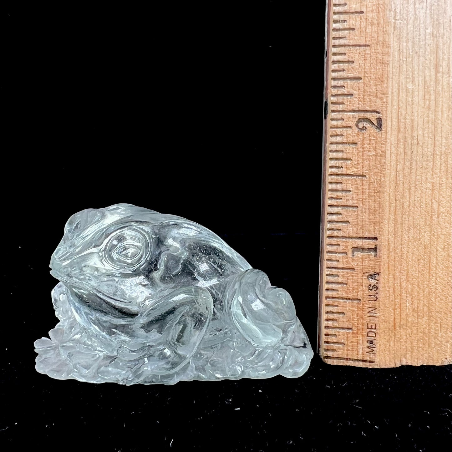 A crystal frog carved from topaz by artist Ronald Stevens.