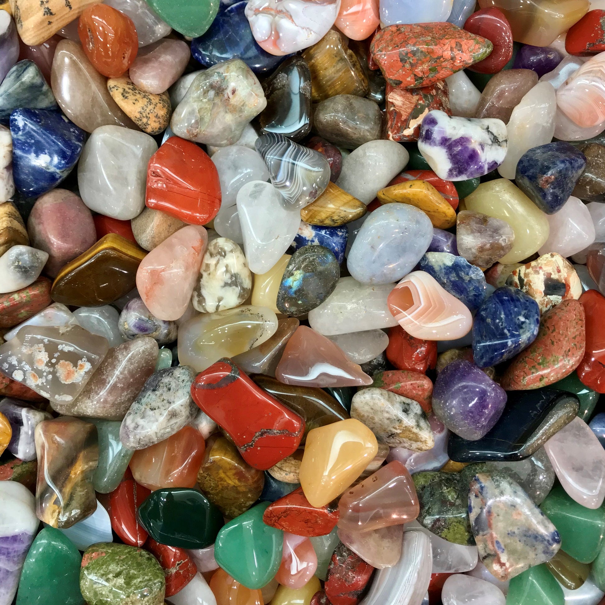Natural multicolored tumbled stones.