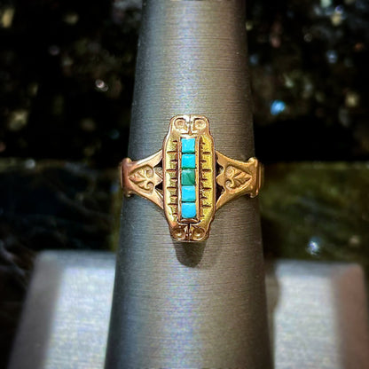 Antique yellow gold ring set with five square turquoise stones, circa 1920's.