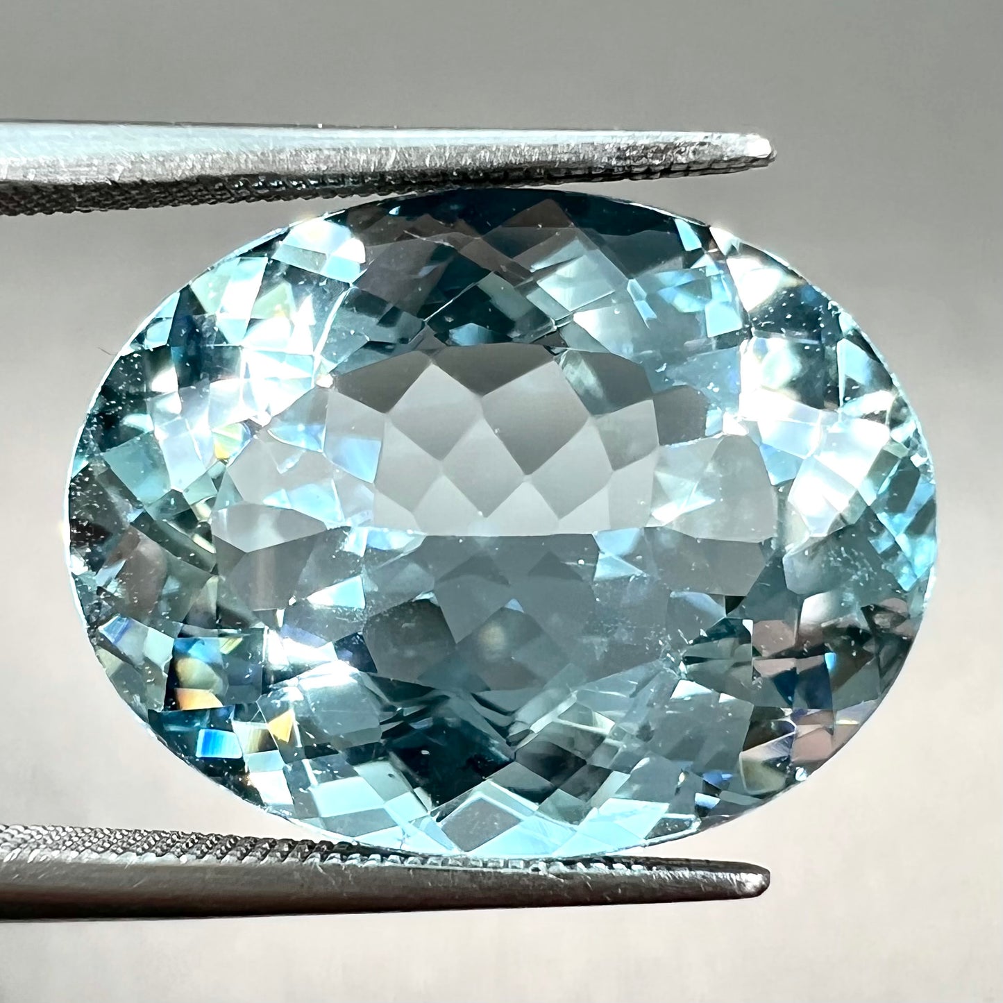 A loose, AAA grade, oval cut aquamarine stone from Brazil.