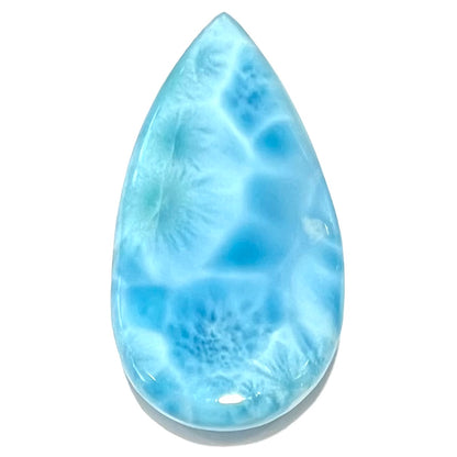 A loose, pear shaped larimar cabochon.  The material is AAA+ grade.