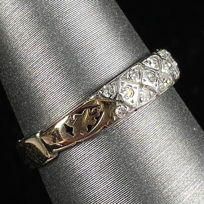 An antique yellow gold ladies' band set with old European cut diamonds.