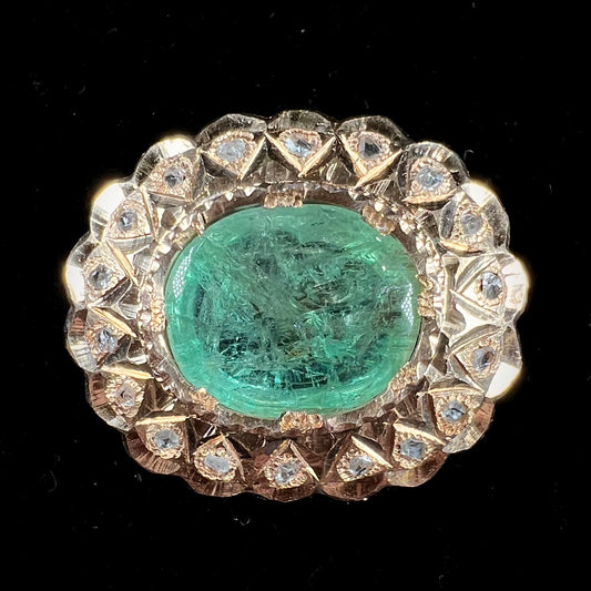 An antique 1800's Victorian emerald and diamond crystal brooch made in 18kt yellow gold.