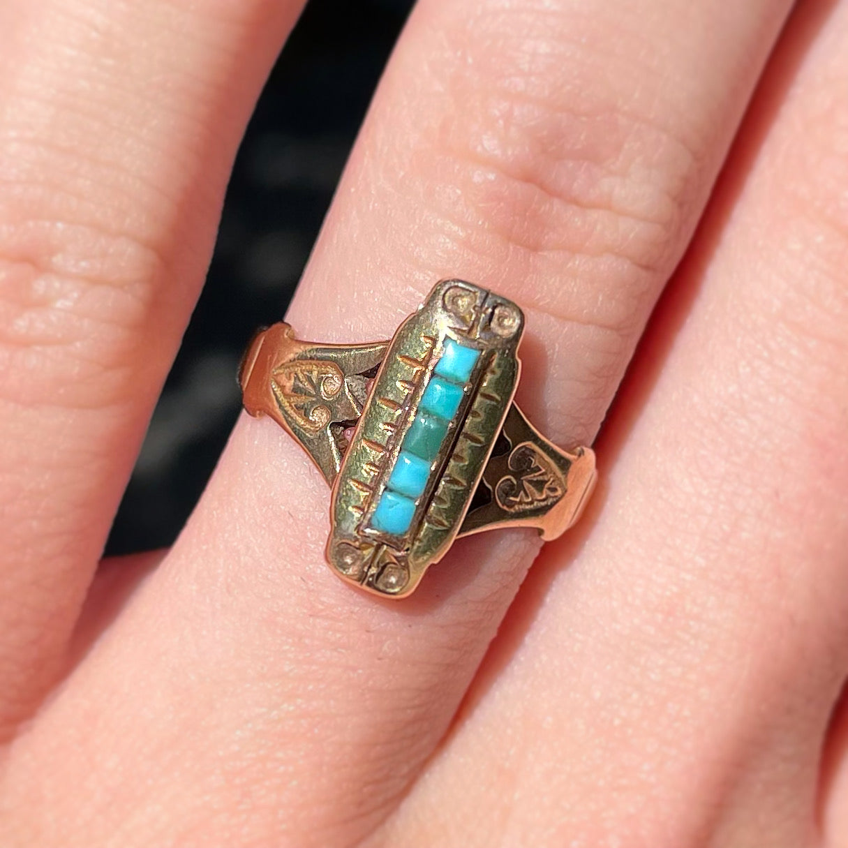 Antique yellow gold ring set with five square turquoise stones, circa 1920's.