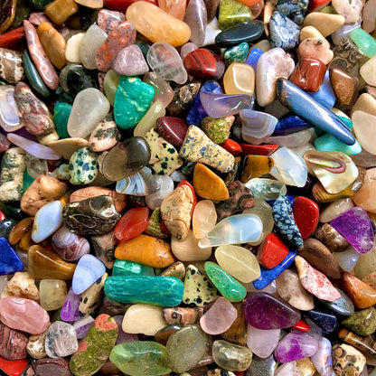 Variety of small, multicolored natural tumbled stone chips.