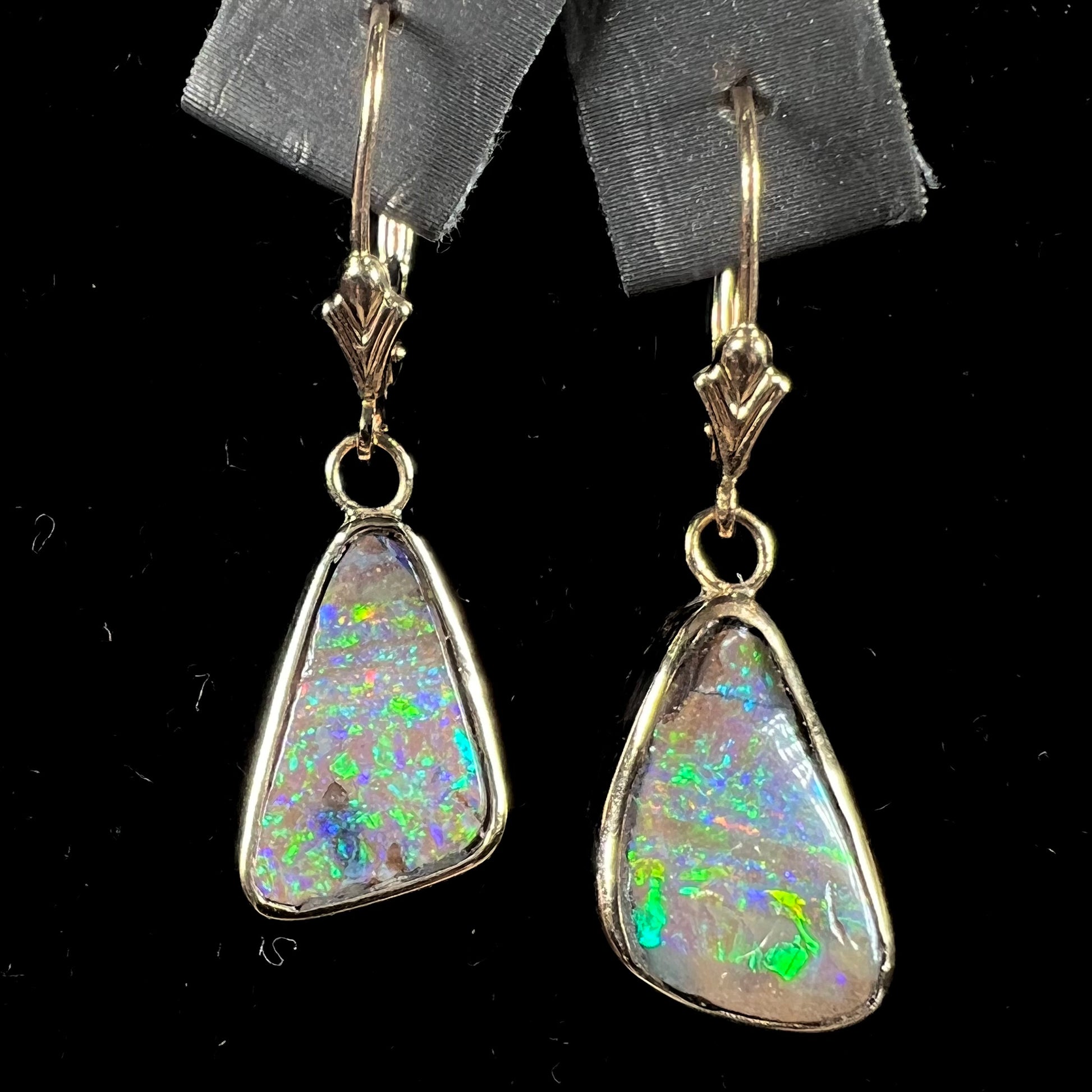 A pair of Australian boulder opal dangle earrings.