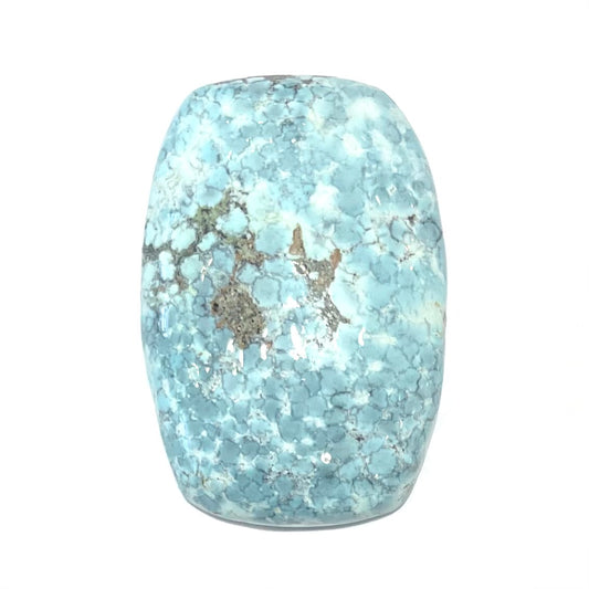 A loose, barrel cabochon cut turquoise stone from Baja California.  The piece is light blue with a gray matrix.