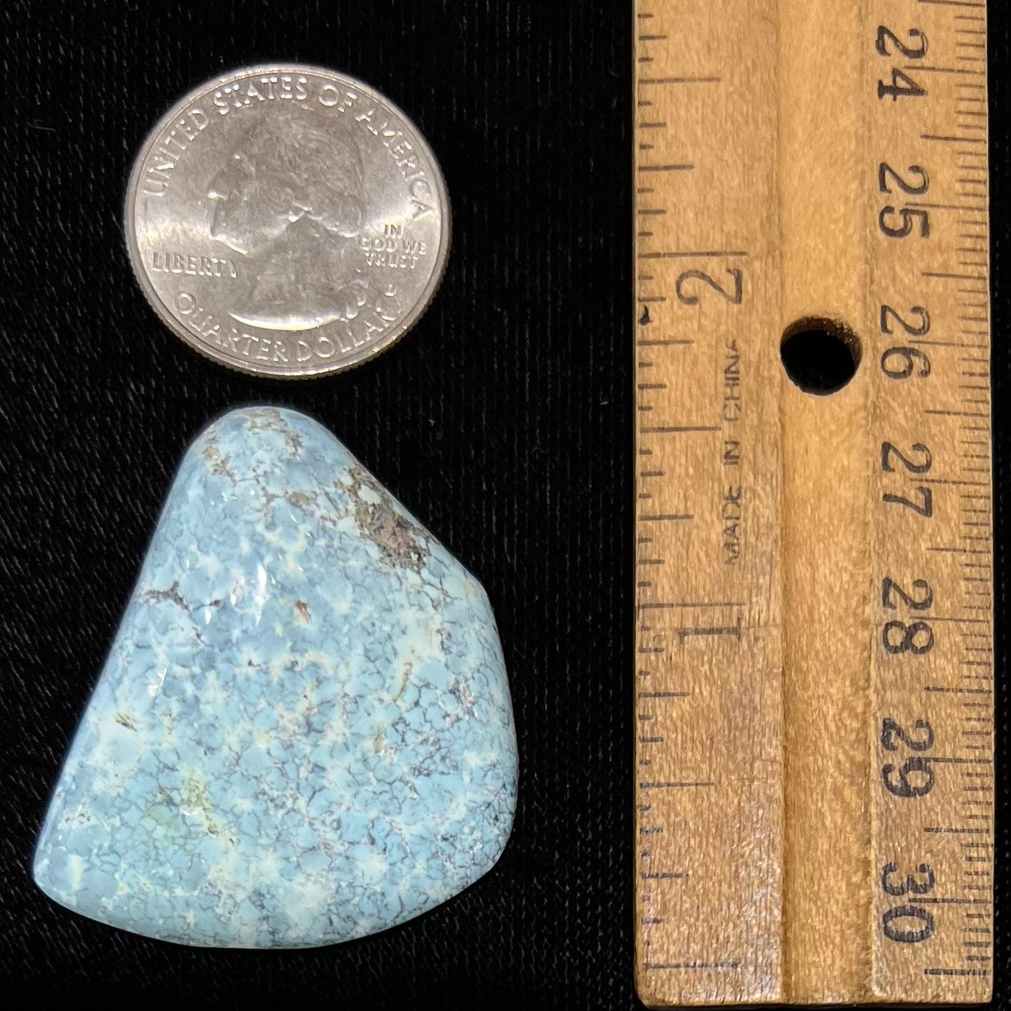 Loose light blue turquoise stone with gray matrix from Baja California, Mexico.