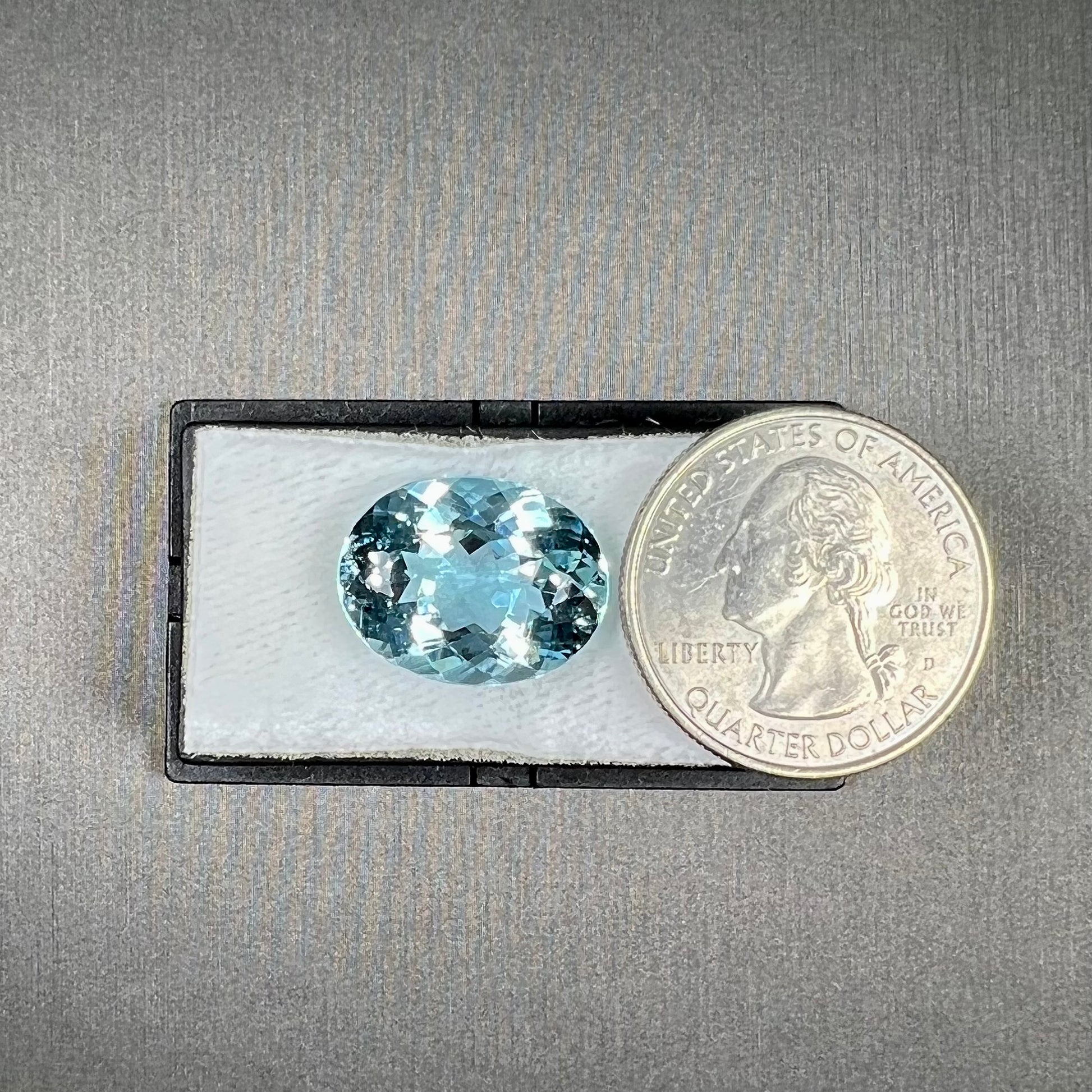 A loose, AAA grade, oval cut aquamarine stone from Brazil.