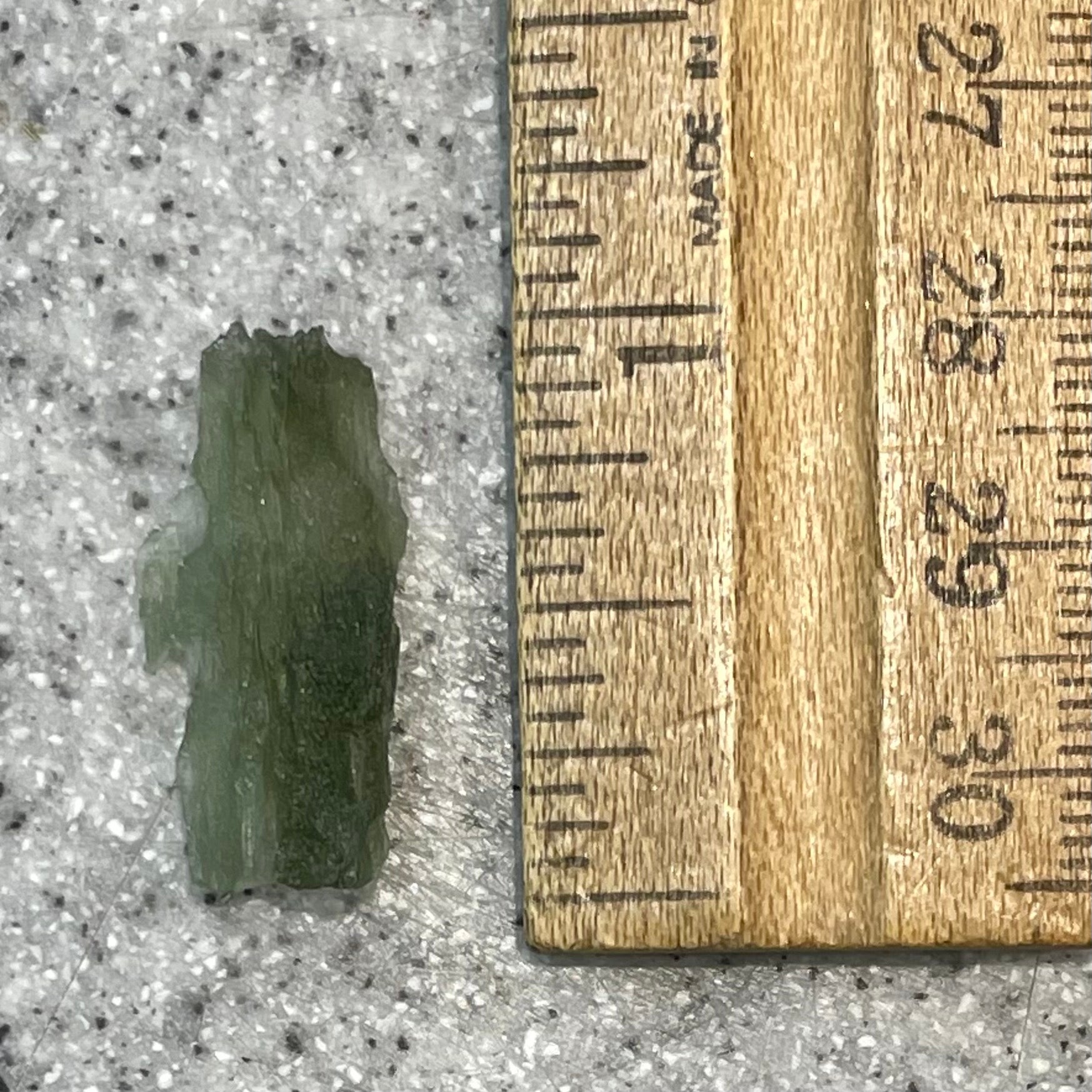 A natural moldavite glass crystal.