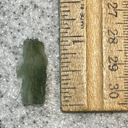 A natural moldavite glass crystal.