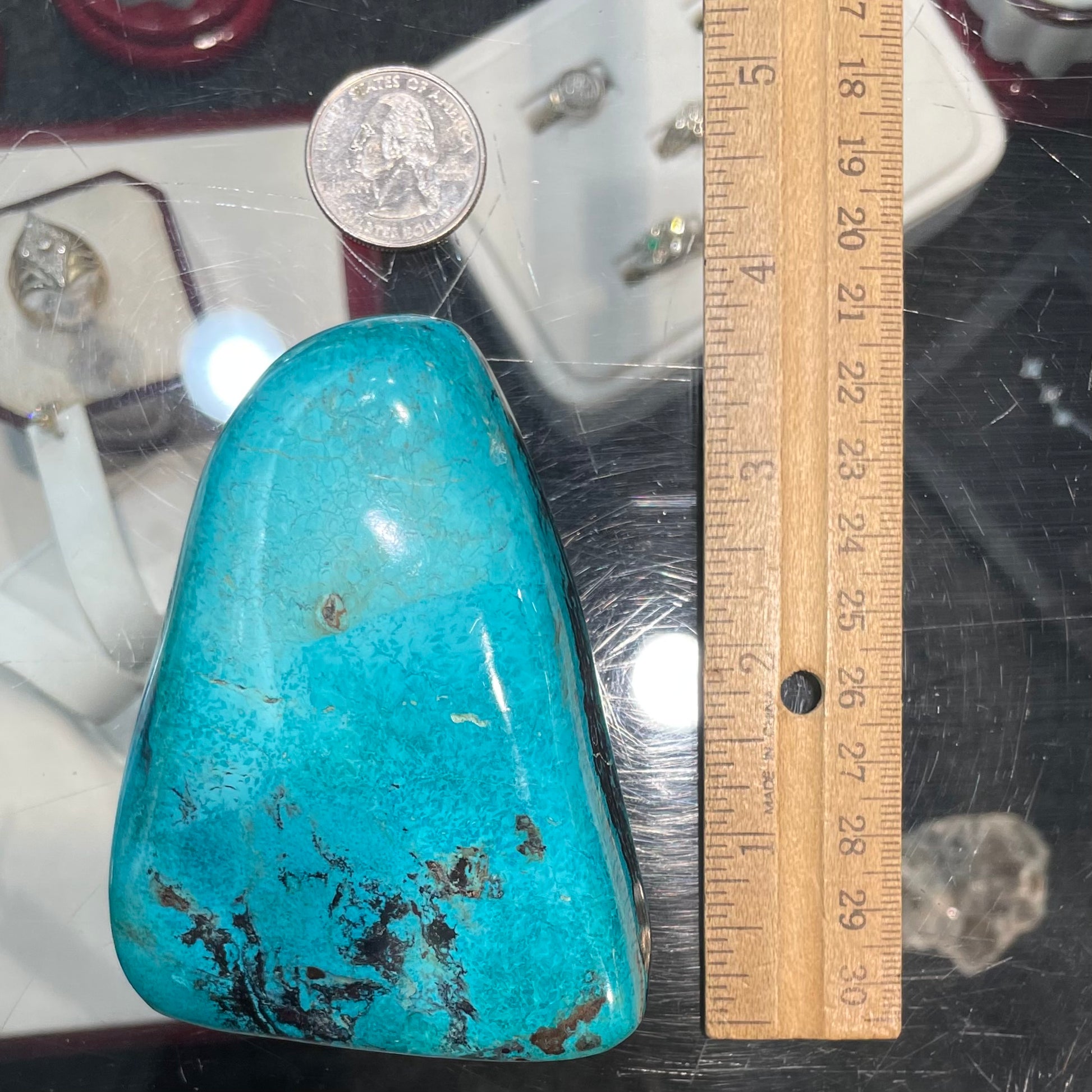 An exceptionally large, freeform shaped, polished turquoise specimen from Morenci, Arizona.