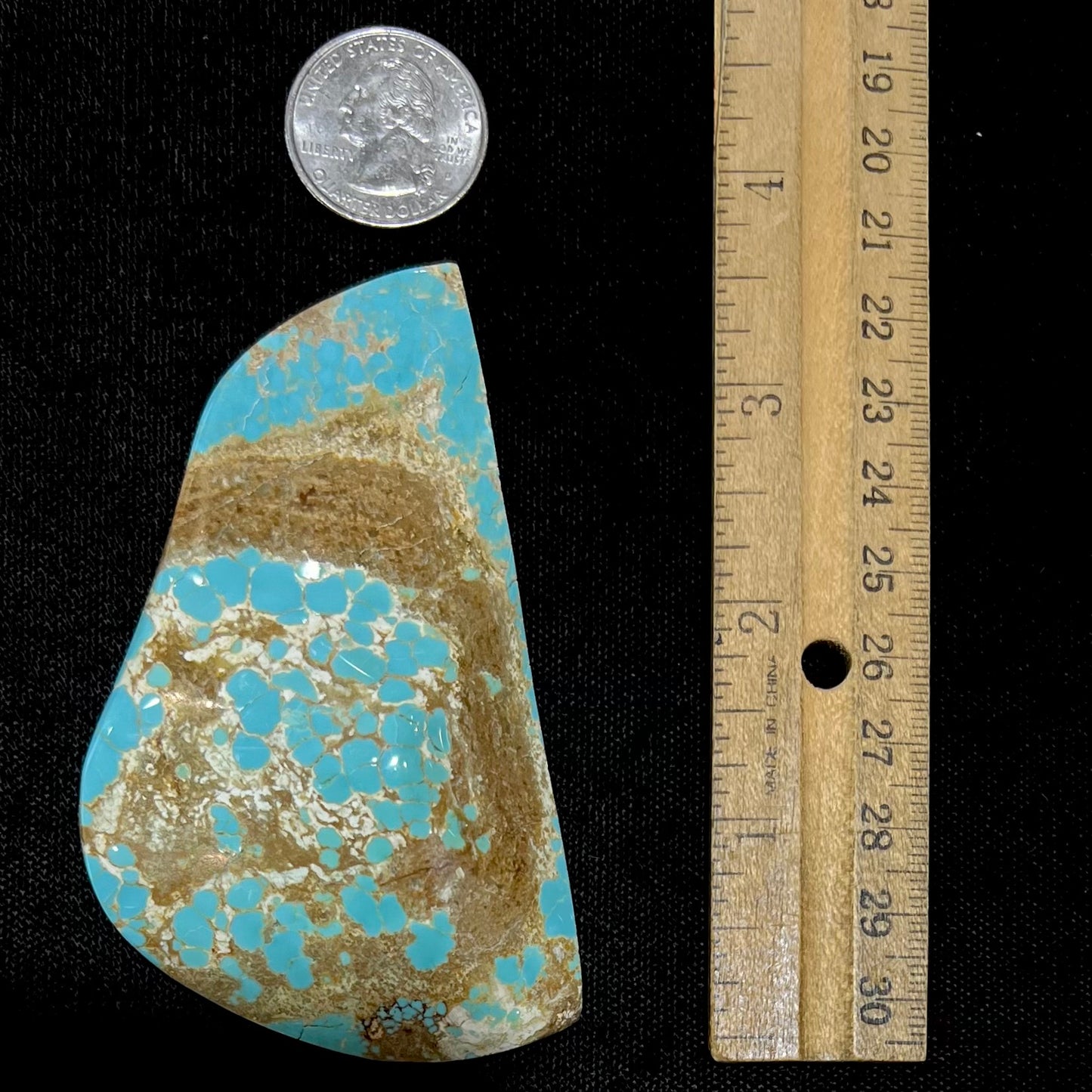 A large, polished turquoise specimen from the Cripple Creek mine.